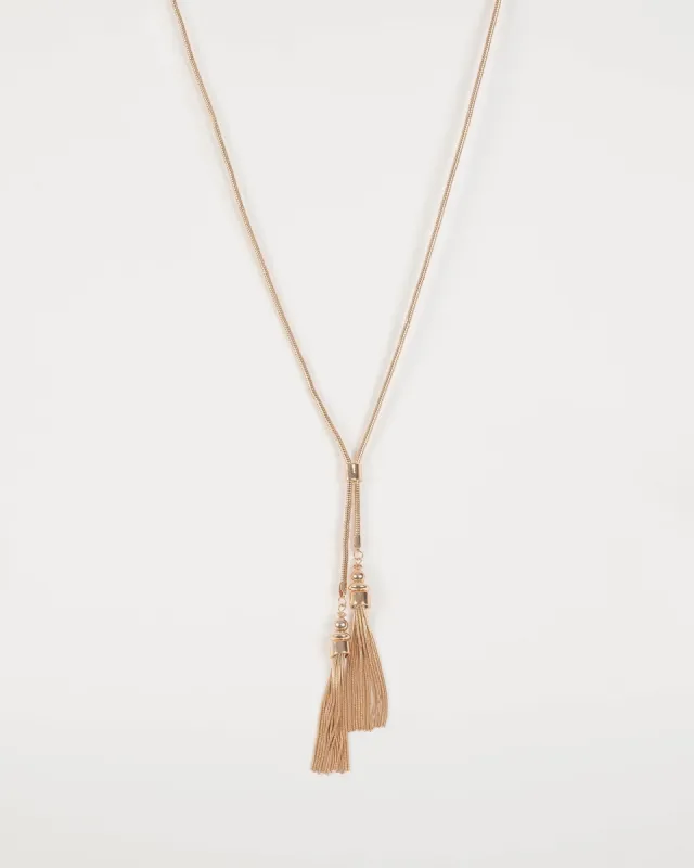 Gold Tone Two Tassel Long Necklace sold by Collete Hayman