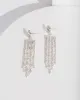 Silver Flower Tassel Earrings sold by Collete Hayman