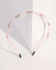 Pink Hearts Thin Headband sold by Collete Hayman