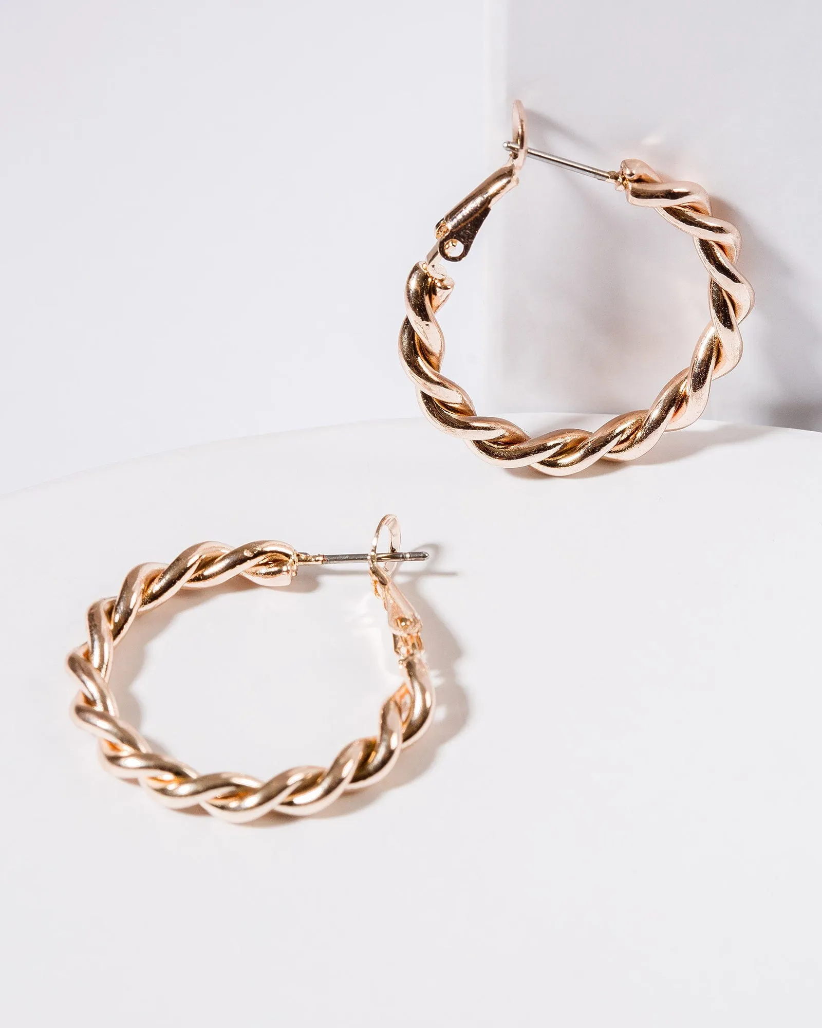 Rose Gold Twisted Hoop Earrings sold by Collete Hayman