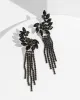 Black Crystal Curved Tassel Earrings sold by Collete Hayman