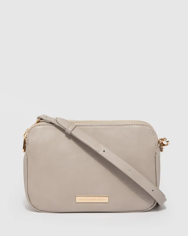 Taupe Amalie Rounded Crossbody Bag sold by Collete Hayman