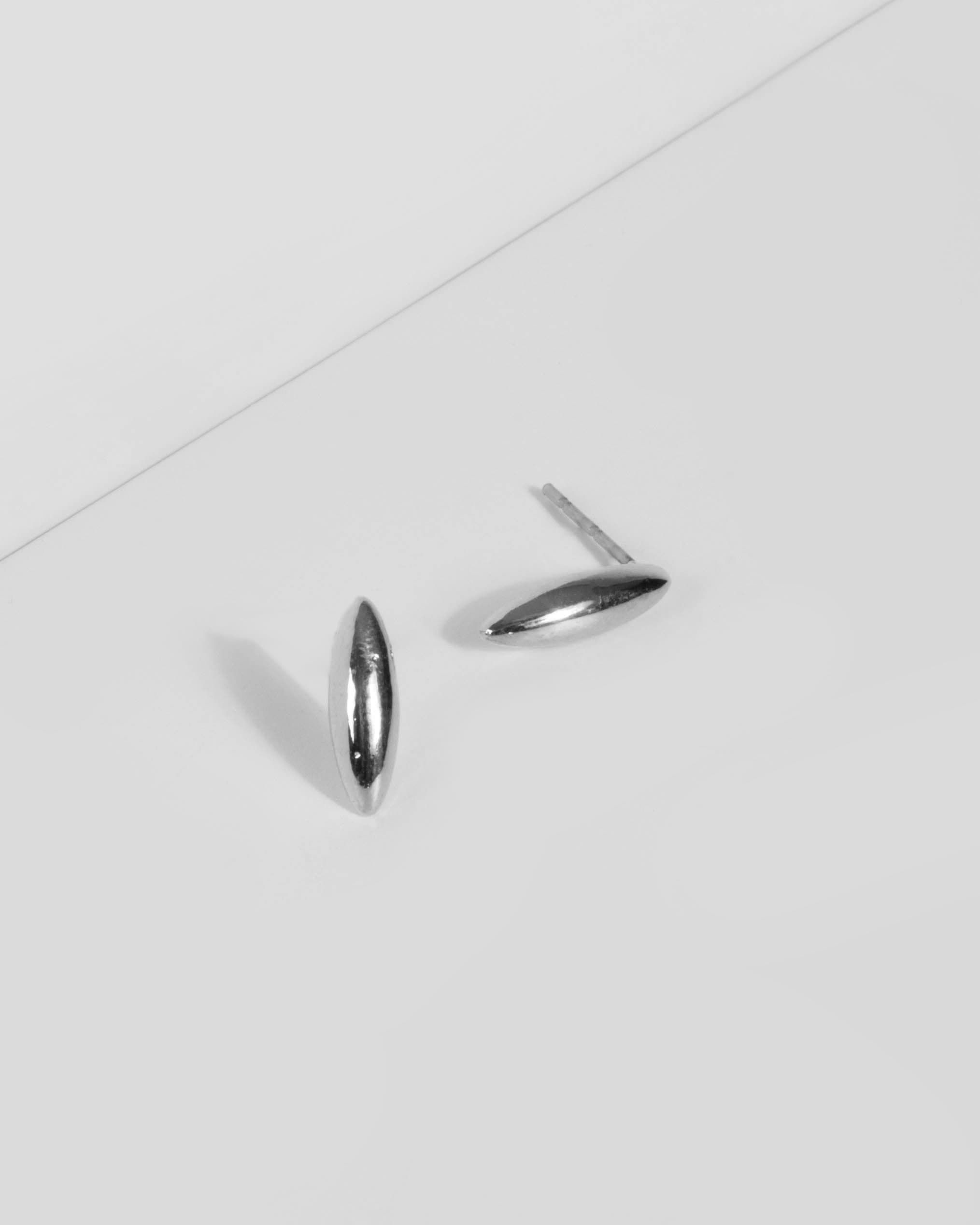 Silver Curved Edge Stud Earrings sold by Collete Hayman