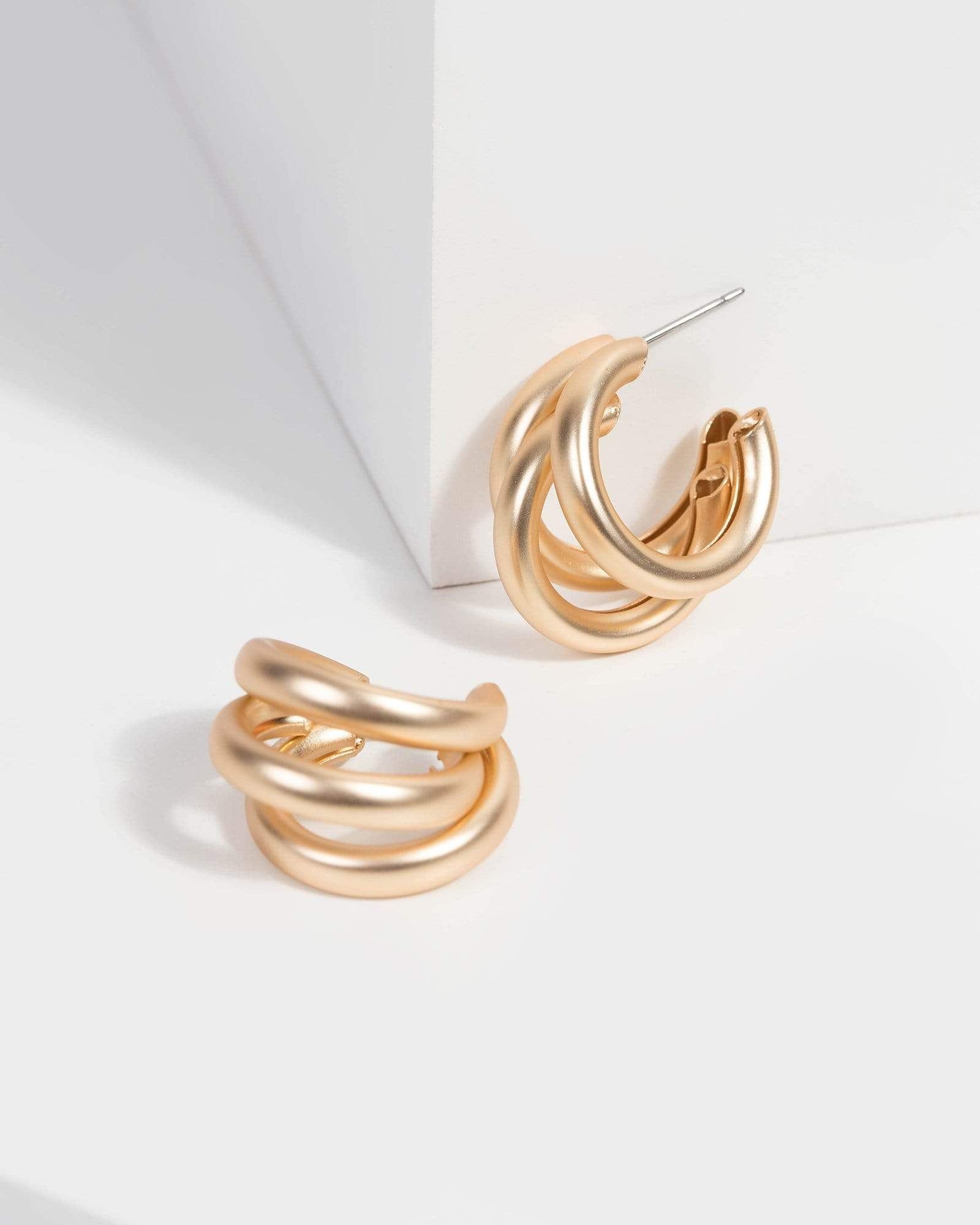 Gold Triple Metal Hoop Earrings sold by Collete Hayman
