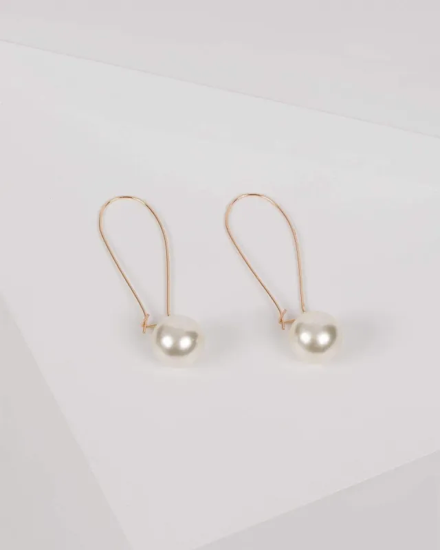 Ivory Gold Tone Pearl Bead Drop Earrings sold by Collete Hayman