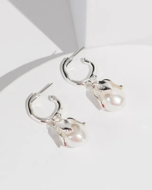 White Pearl Flower Huggie Hoop Earrings sold by Collete Hayman