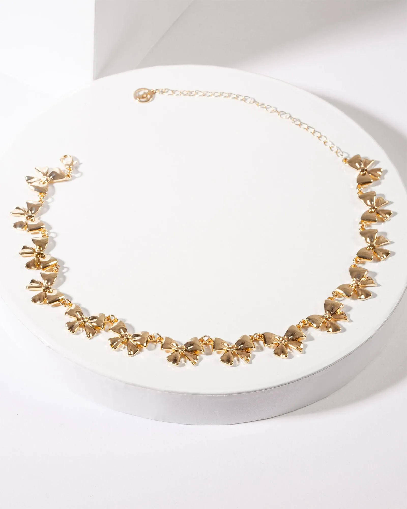Gold Metal Bow Necklace sold by Collete Hayman product image thumbnail 2
