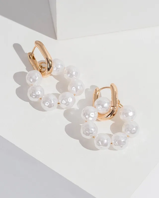 White Pearl Loop Huggie Hoop Earrings sold by Collete Hayman