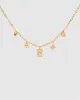 Gold Multi Pendant Statement Necklace sold by Collete Hayman