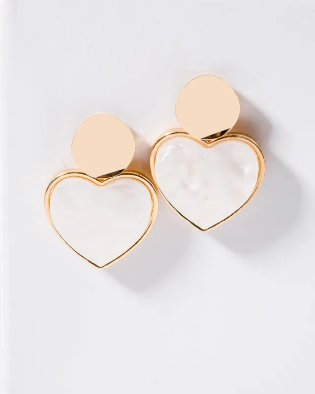 White Heart Earrings sold by Collete Hayman