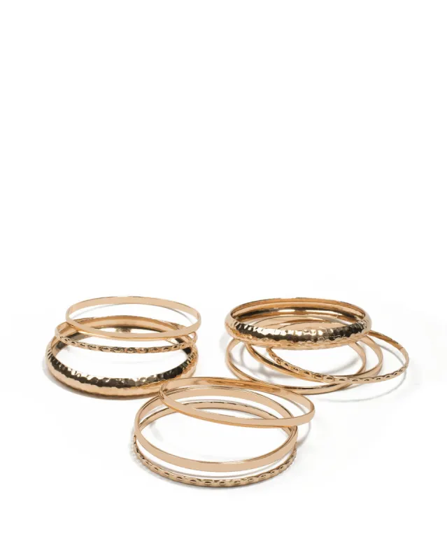 Gold Tone Hammered Metal Bangle Pack sold by Collete Hayman