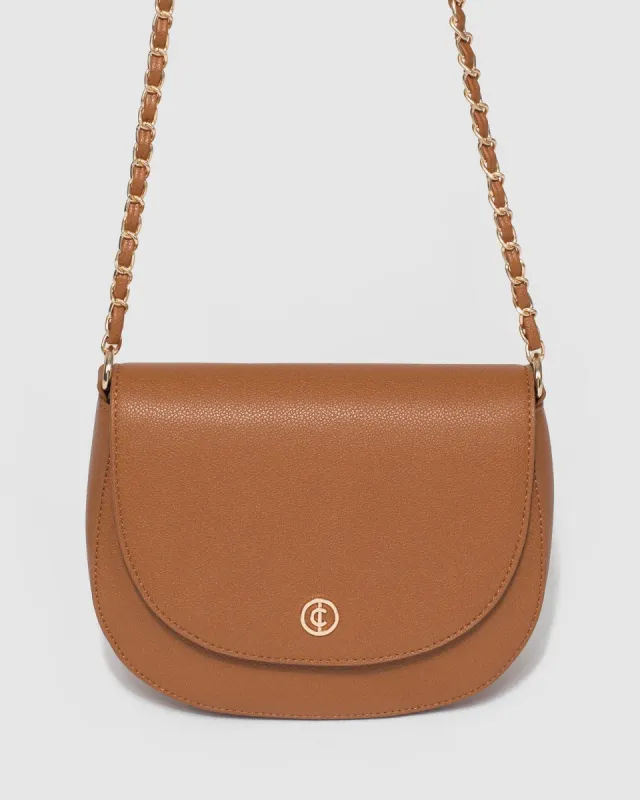 Sadie Tan Saddle Crossbody Bag sold by Collete Hayman