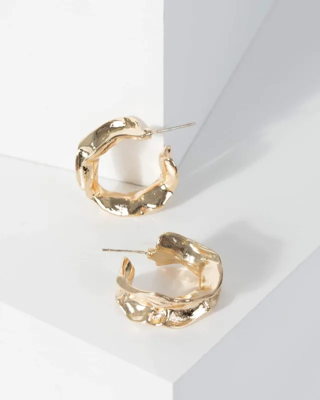 Gold Metal Textured Hoop Earrings sold by Collete Hayman