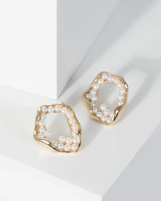 Gold Textured And Pearl Detail Open Earrings sold by Collete Hayman