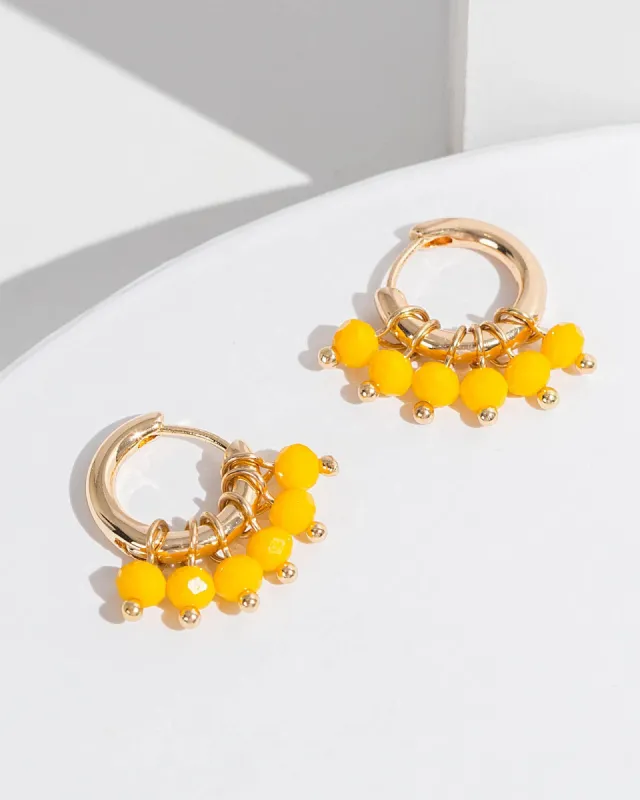 Yellow Bead Cluster Huggie Hoop Earrings sold by Collete Hayman