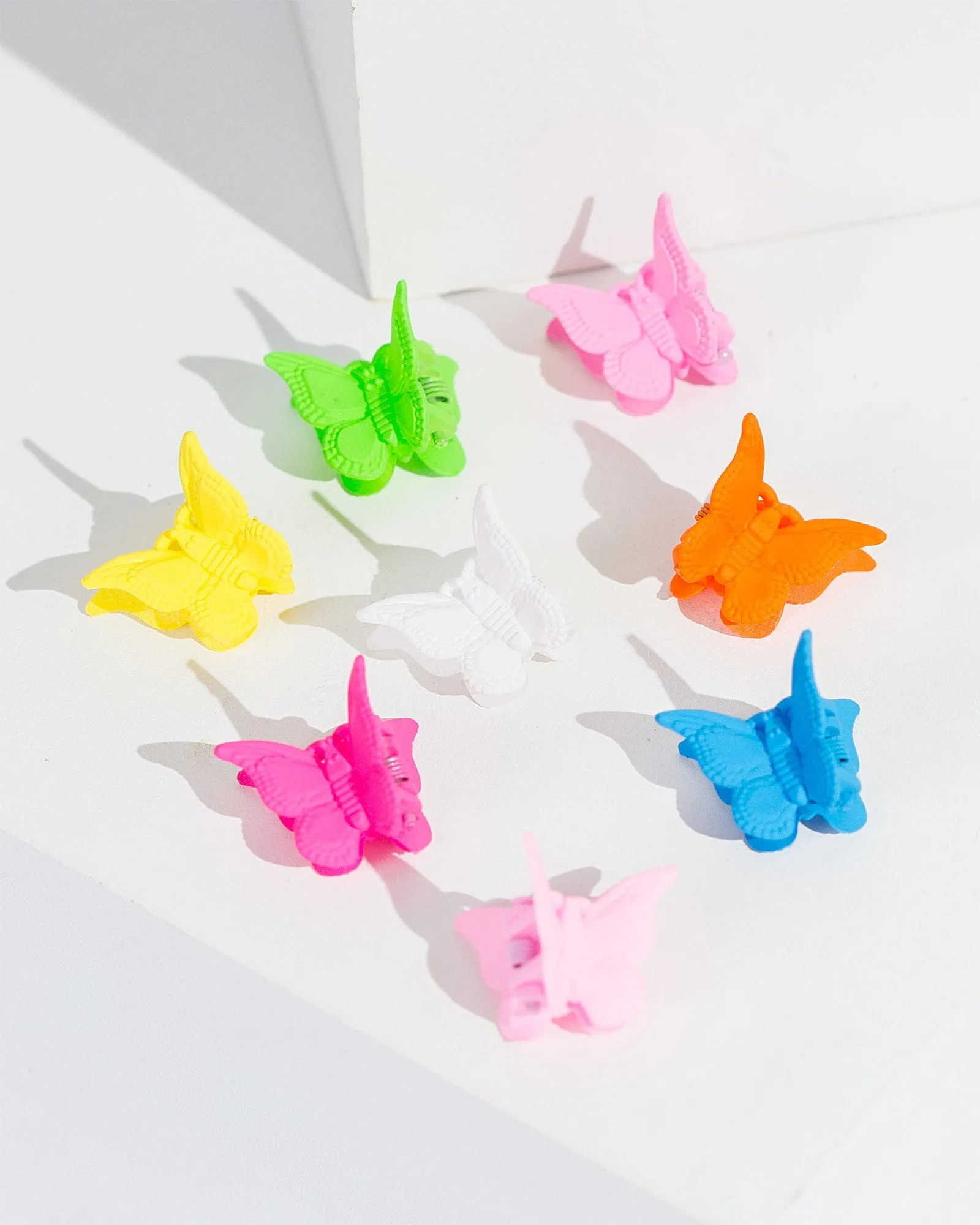 Multi Colour 8 Pack Mini Butterfly Hair Clips sold by Collete Hayman