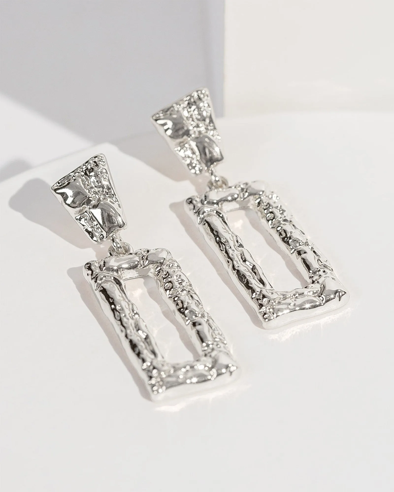 Silver Textured Rectangle Drop Earrings sold by Collete Hayman