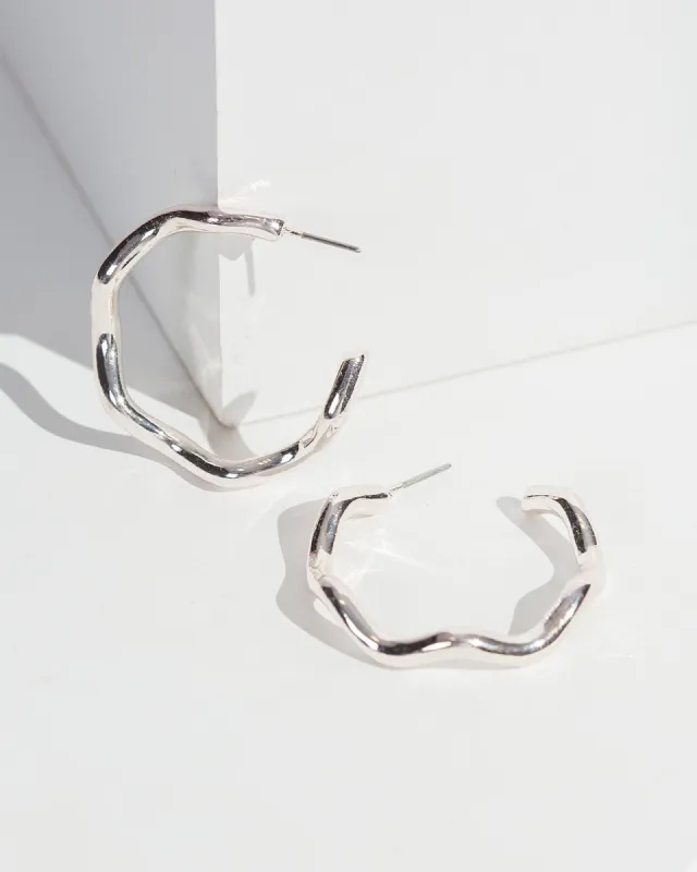 Silver Wavy Hoop Earrings sold by Collete Hayman