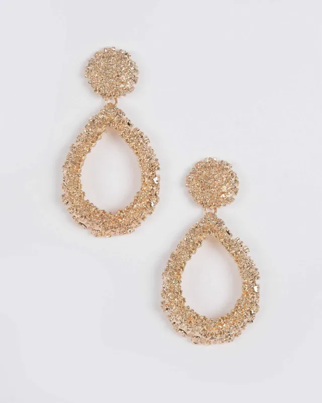 Gold Textured Teardrop Earrings sold by Collete Hayman