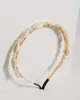 Pearl and Shell Headband sold by Collete Hayman