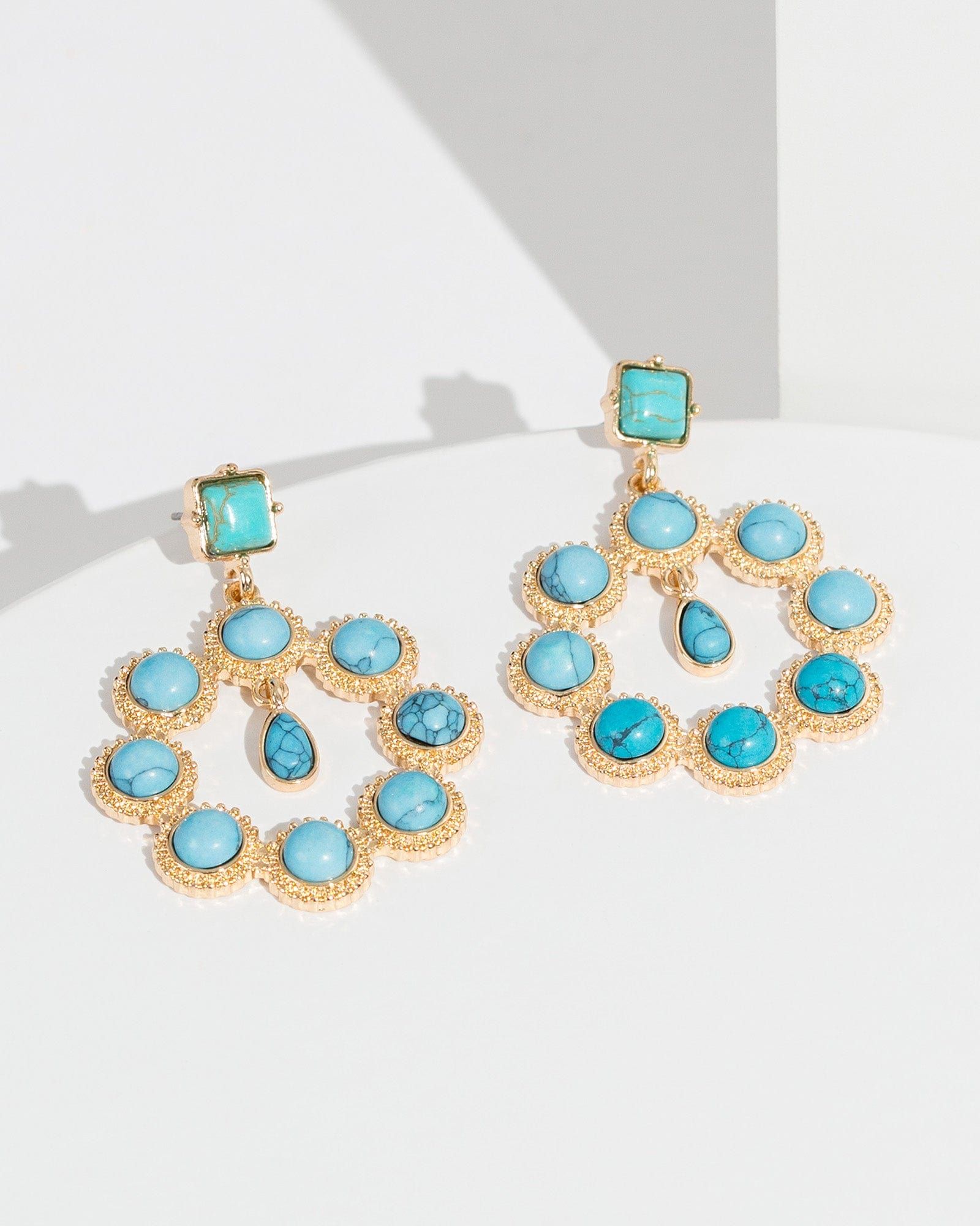 Blue Stone Halo Earrings sold by Collete Hayman