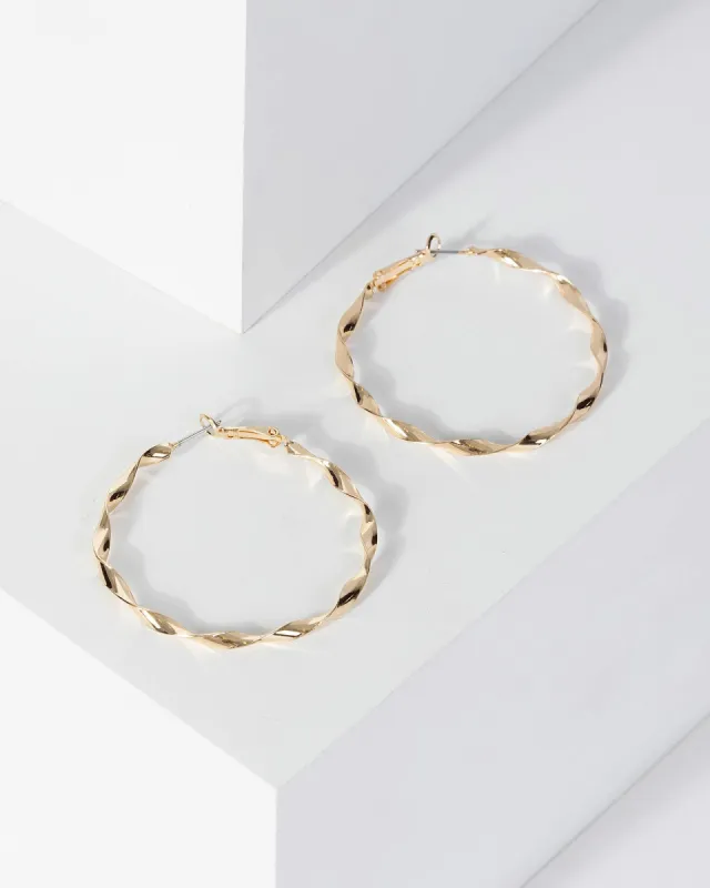 Gold 50mm Twist Hoop Earrings sold by Collete Hayman