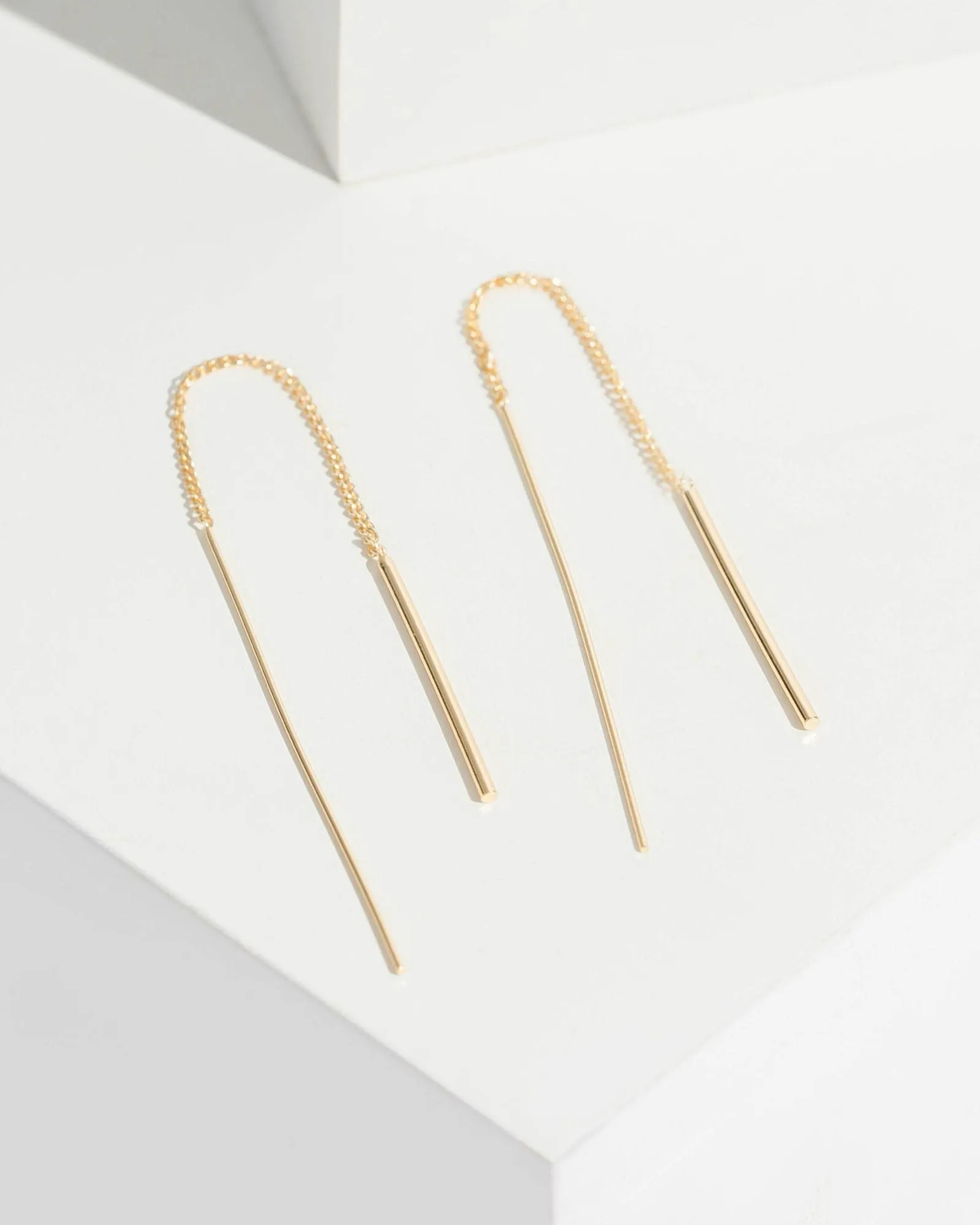 Gold Metal Bar End Thread Earrings sold by Collete Hayman
