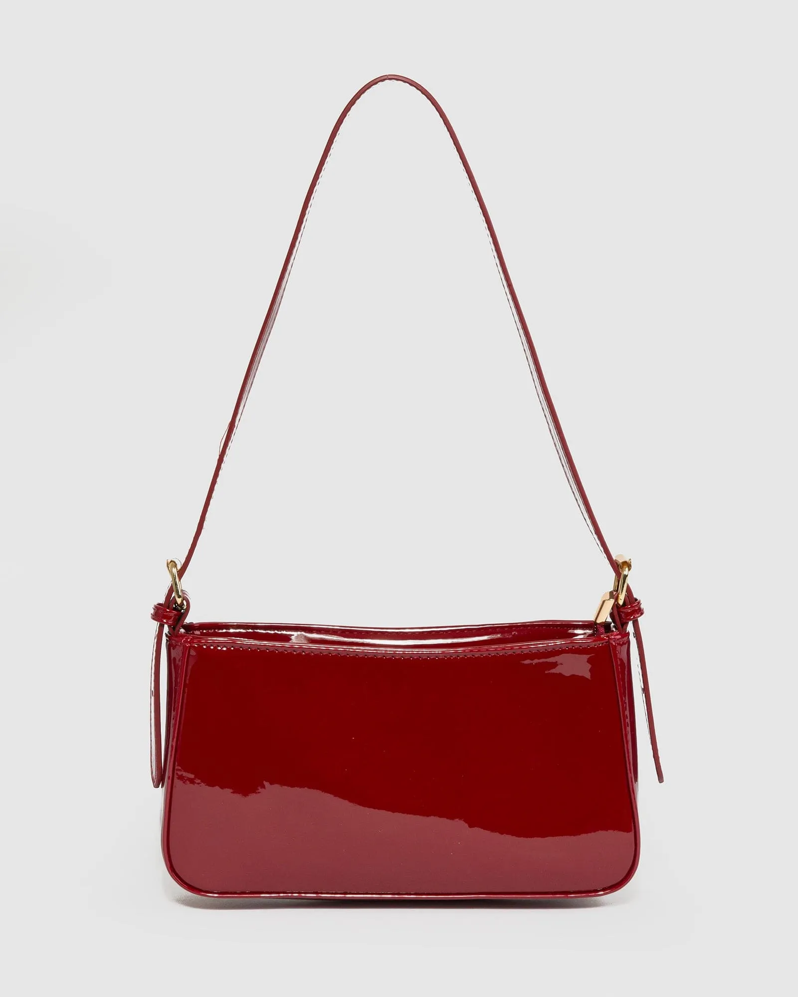 Cherry Red Frankie Buckle Strap Shoulder Bag sold by Collete Hayman