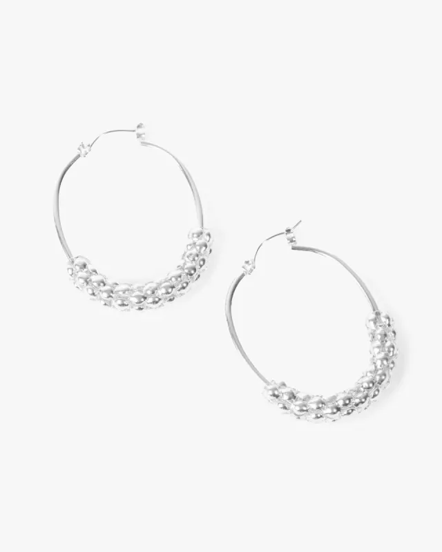 Silver Textured Oval Hoop Earrings sold by Collete Hayman