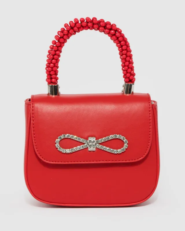 Red Jada Bow Mini Top Handle Bag sold by Collete Hayman