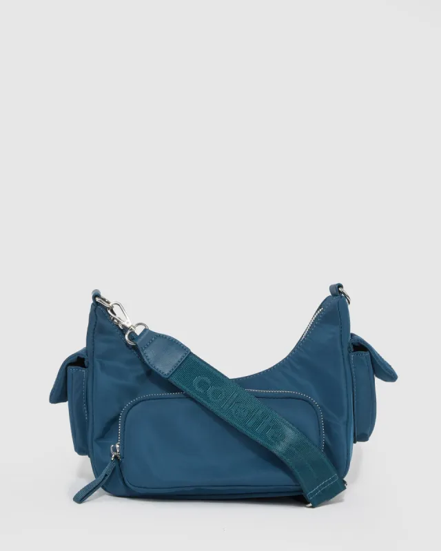Navy Jaimie Pouch Crossbody Bag sold by Collete Hayman