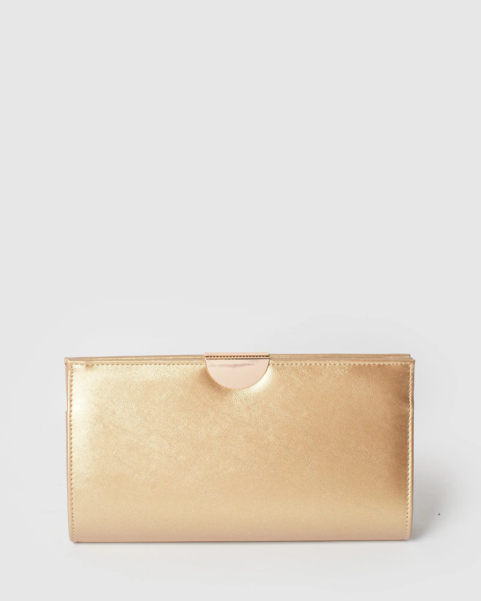 Gold Carlie Clutch Bag sold by Collete Hayman