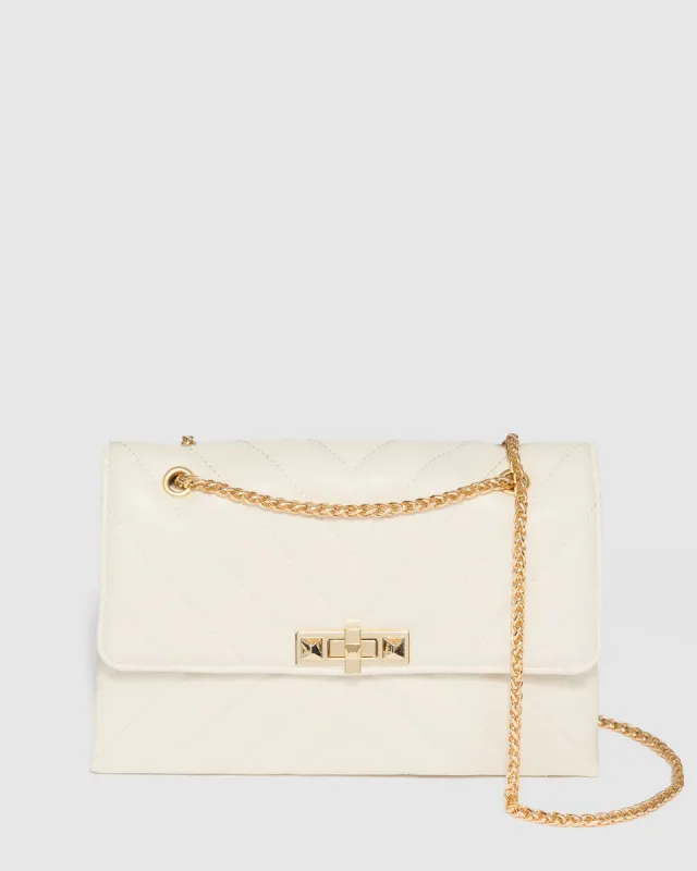 Ivory Zion Arrow Crossbody Bag sold by Collete Hayman