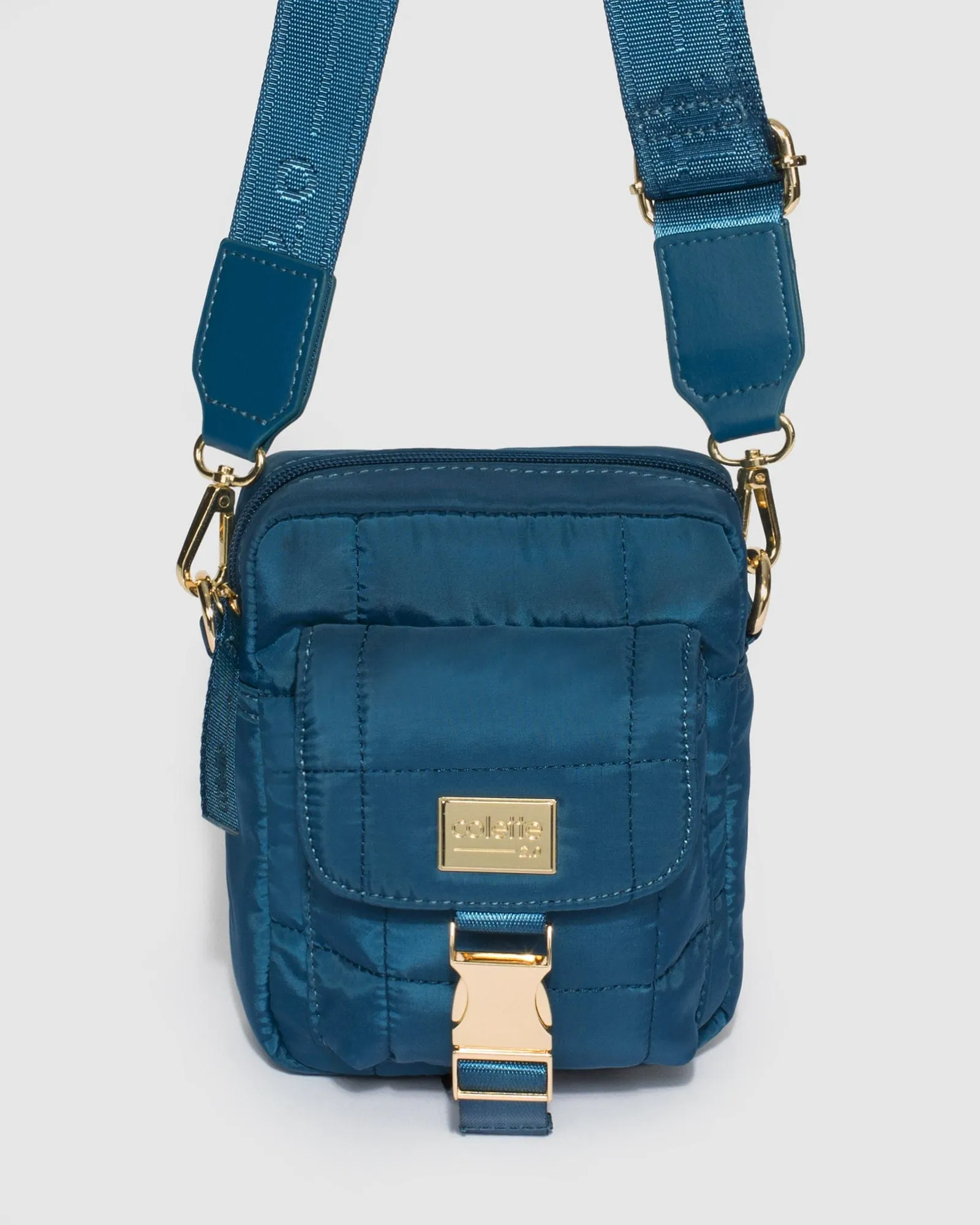 Navy Emma Lock Crossbody Bag sold by Collete Hayman