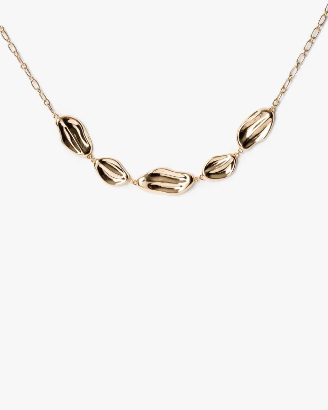 Gold Pebble Statement Necklace sold by Collete Hayman