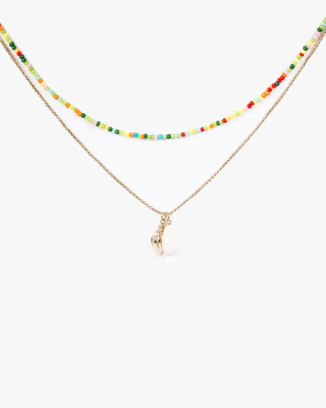 Gold Beaded Beach Charm 2 Layer Necklace sold by Collete Hayman