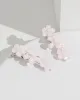 Pink 2 Pack Flower And Pearl Hair Slides sold by Collete Hayman