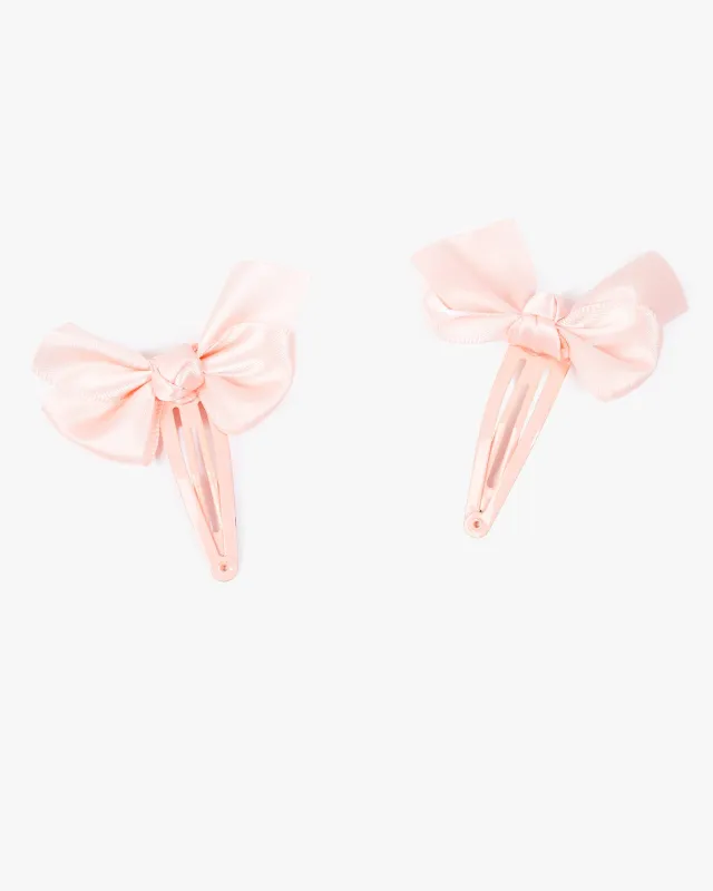 Pink 2 Pack Bow Hair Clips sold by Collete Hayman