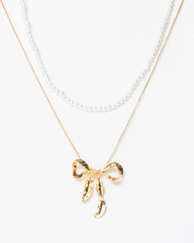 Gold Bow Charm Pearl Detail 2 Pack Necklace sold by Collete Hayman