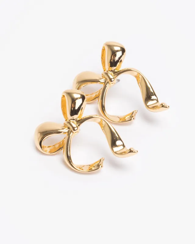 Gold Metal Twisted Bow Stud Earrings sold by Collete Hayman