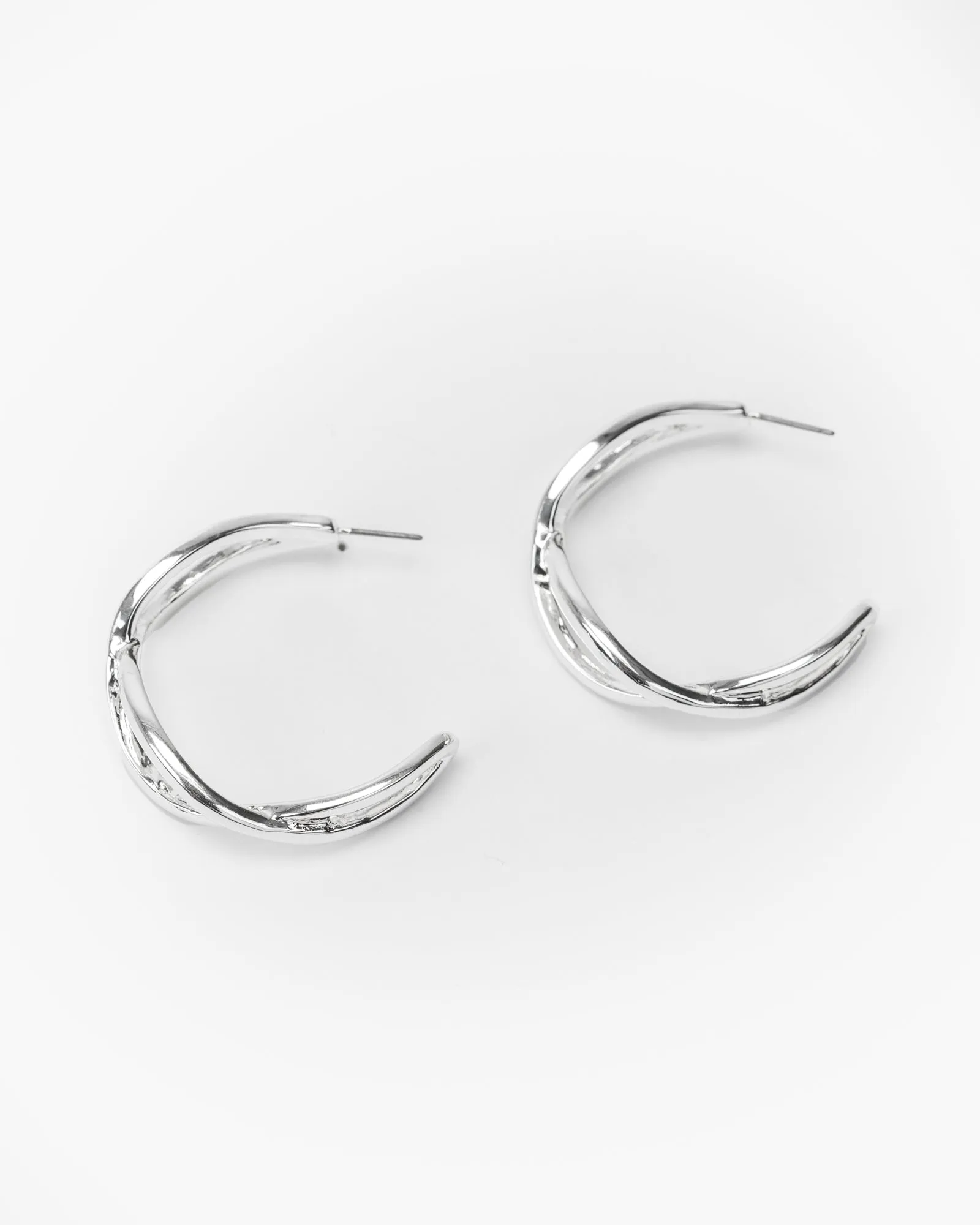 Silver Light Twist Hoop Earrings sold by Collete Hayman