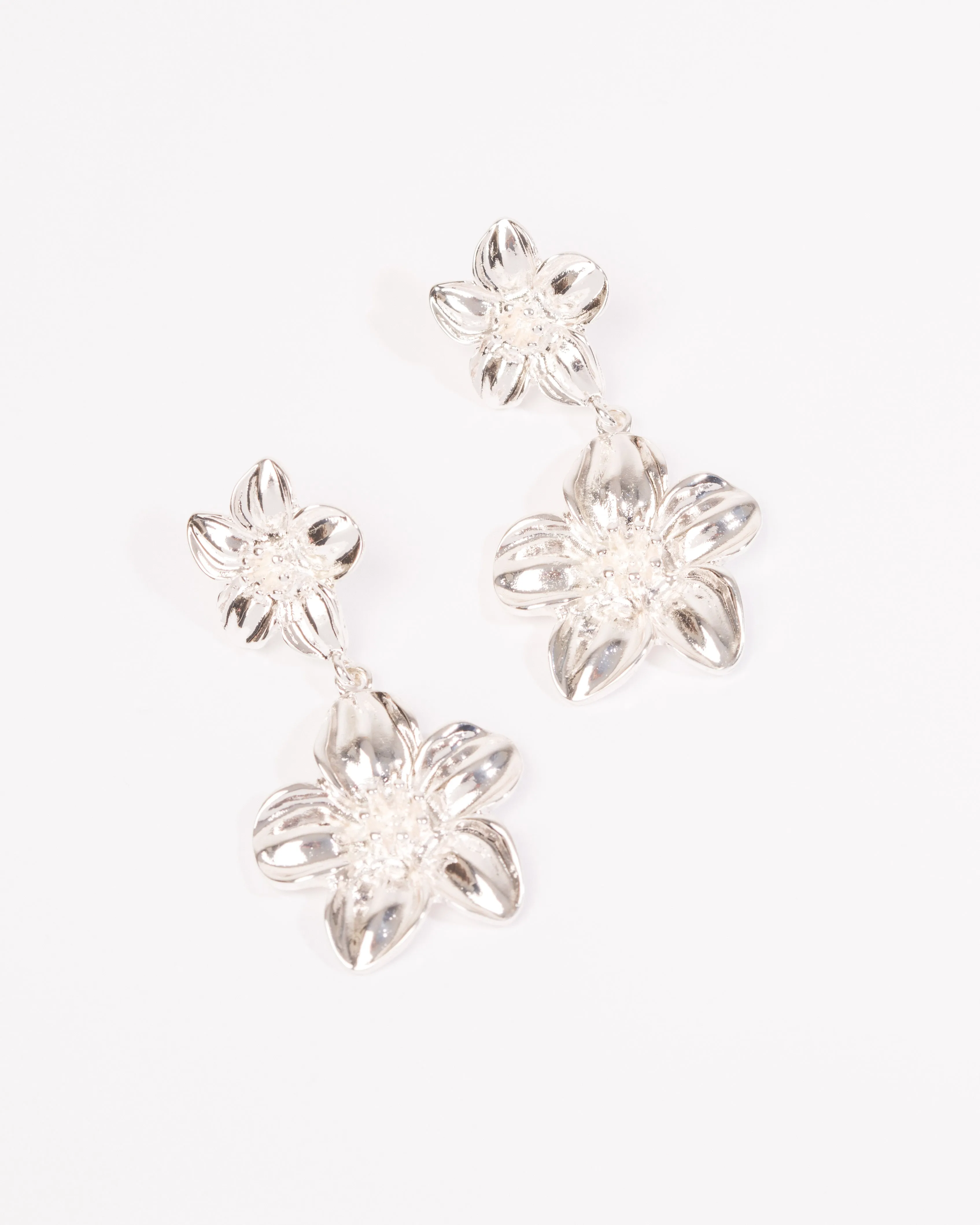 Silver Flower Drop Earrings sold by Collete Hayman