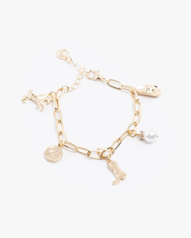 Gold Western Charm Bracelet sold by Collete Hayman