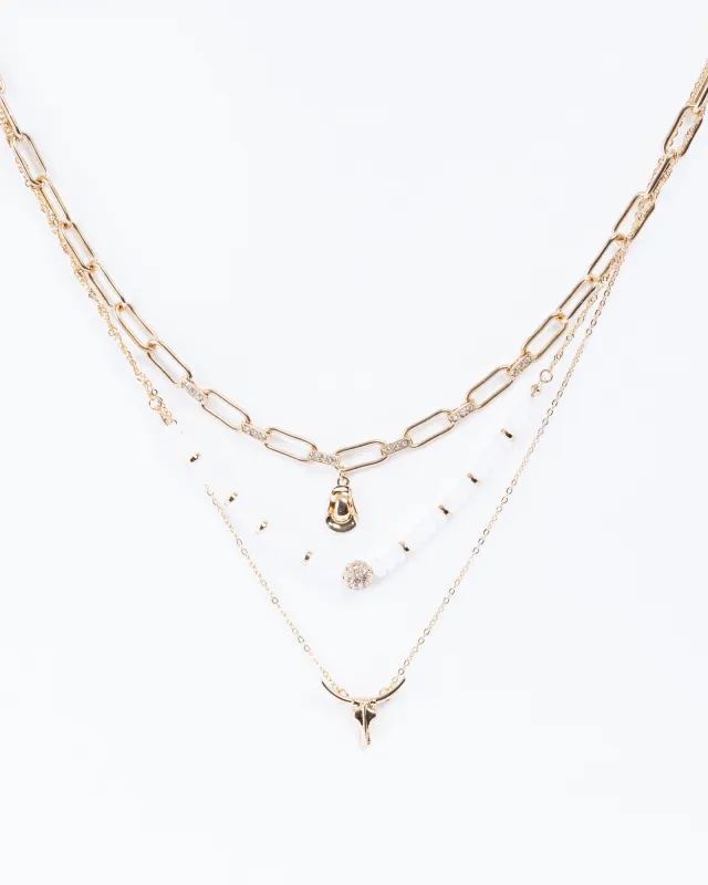 Gold Cowboy Charm Necklace sold by Collete Hayman