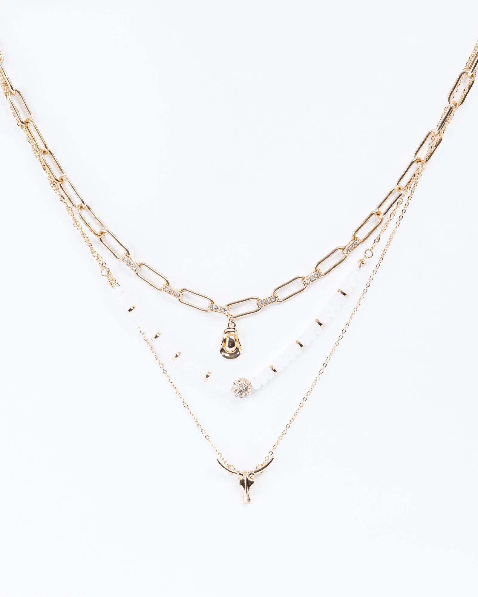 Gold Cowboy Charm Necklace sold by Collete Hayman