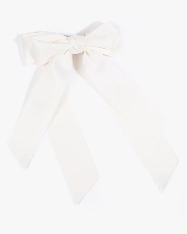 White Double Bow Hair Slide sold by Collete Hayman
