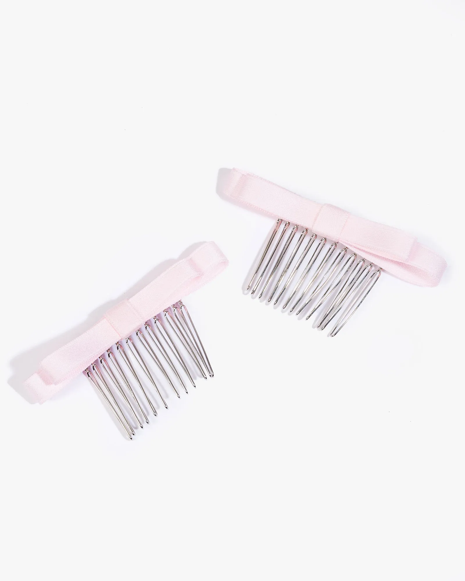 Pink 2 Pack Bow Hair Comb sold by Collete Hayman