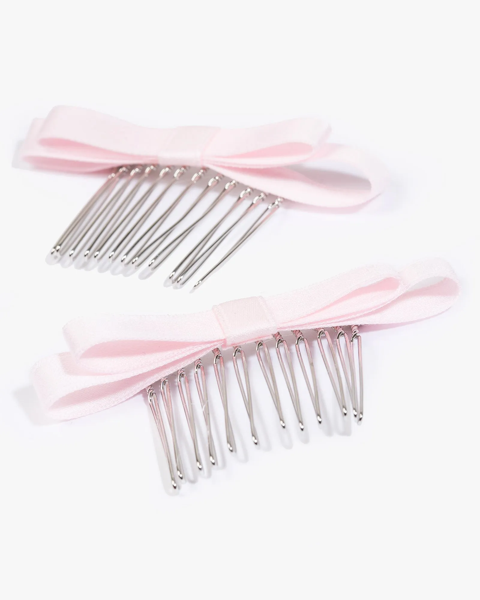 Pink 2 Pack Bow Hair Comb sold by Collete Hayman product image thumbnail 2