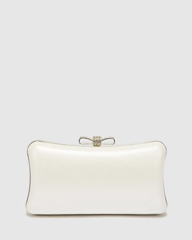White Lia Bow Hardcase Clutch Bag sold by Collete Hayman