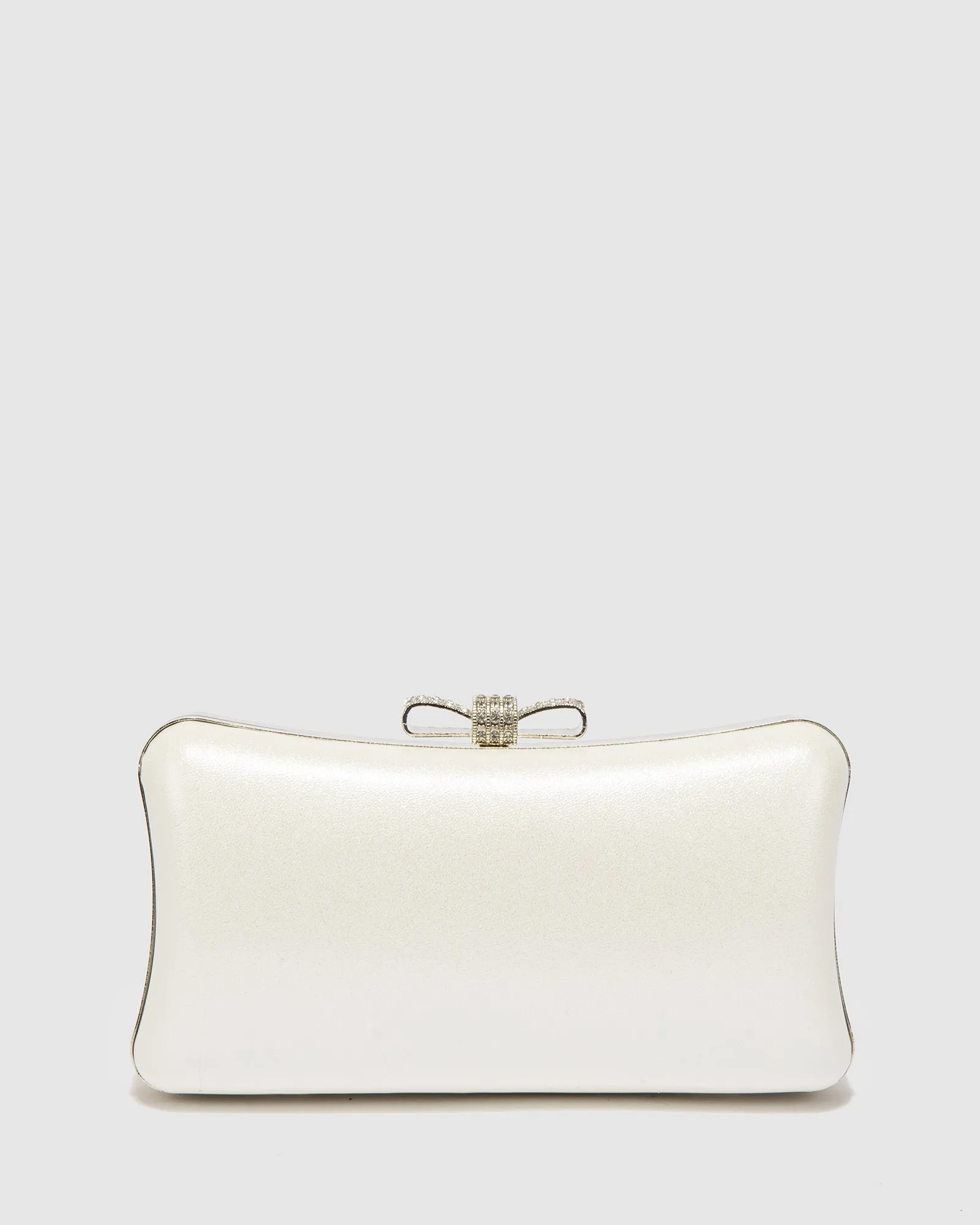 White Lia Bow Hardcase Clutch Bag sold by Collete Hayman